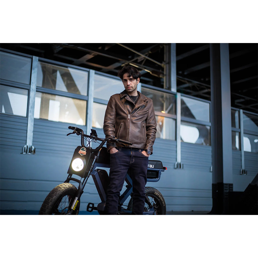 Person standing with Eunorau Flash e-bike