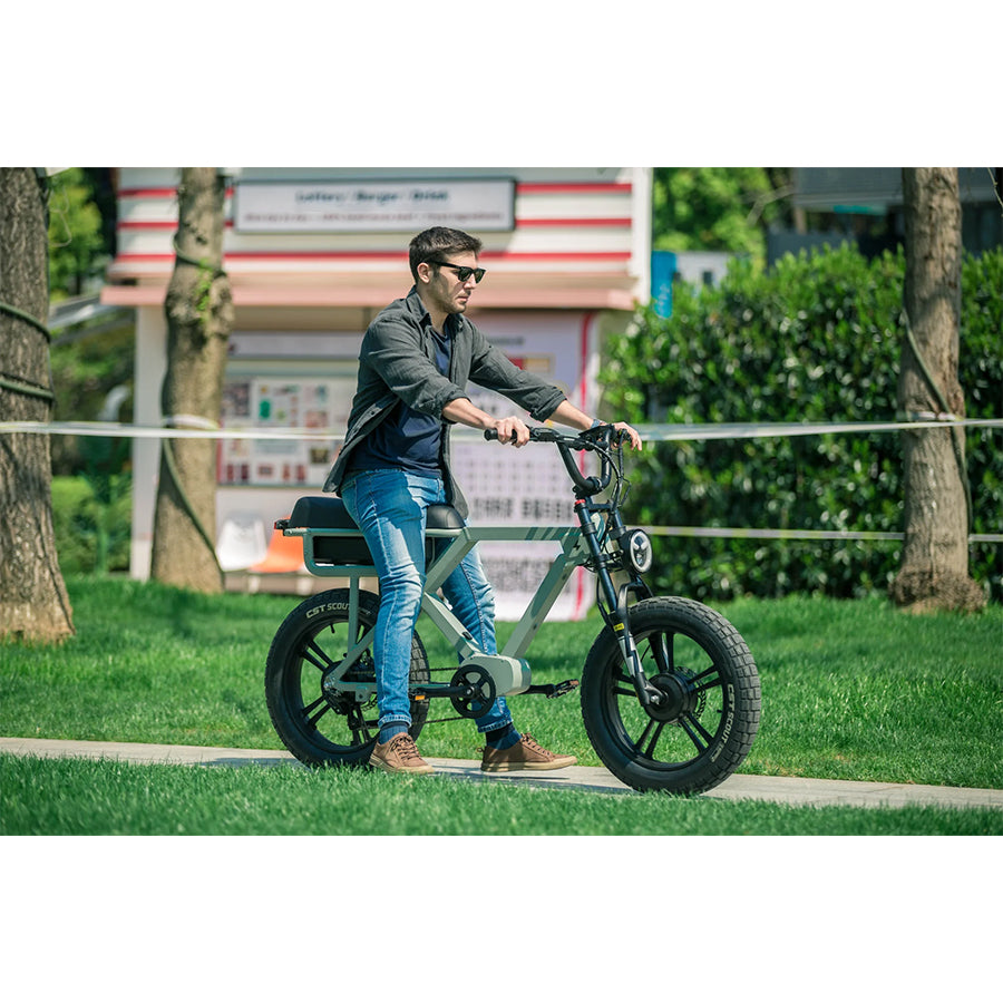Person riding Eunorau Flash e-bike in park