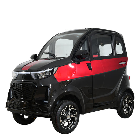 Black and red compact electric vehicle, side view
