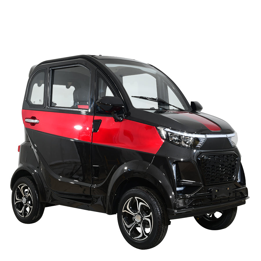 Black and red compact electric vehicle, angled view