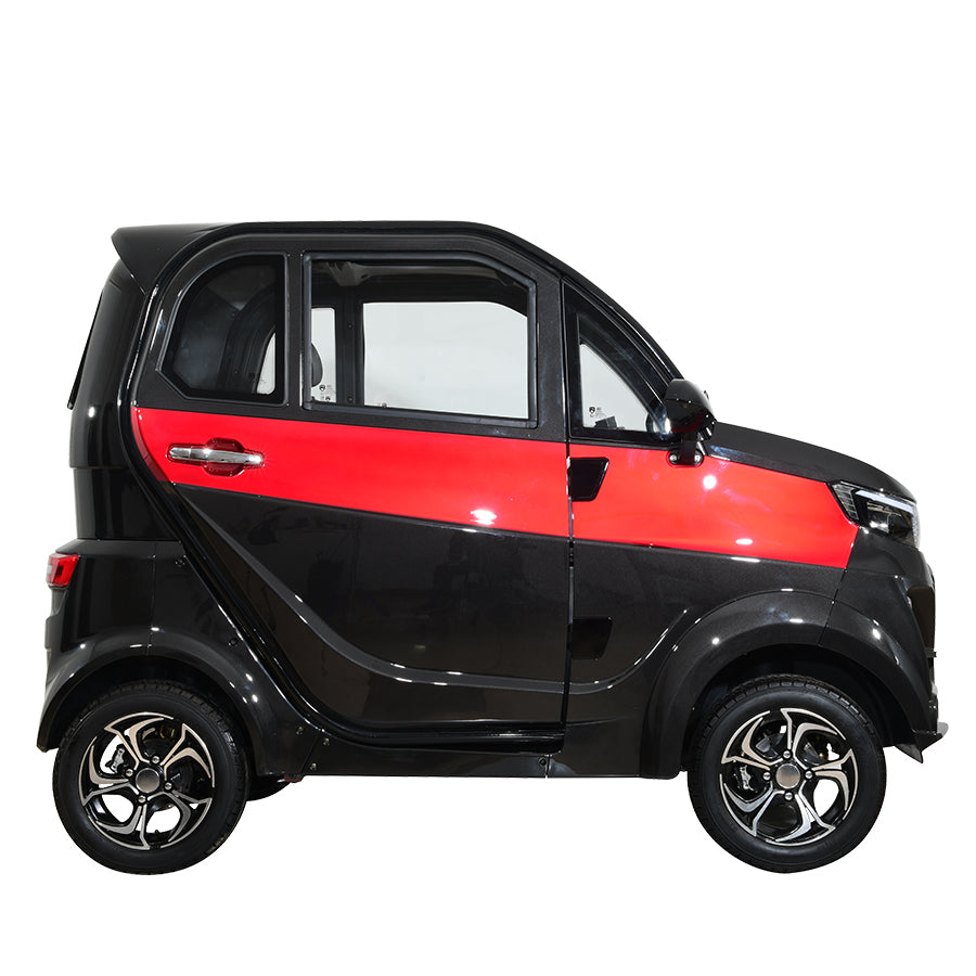 Black and red compact electric vehicle, side profile