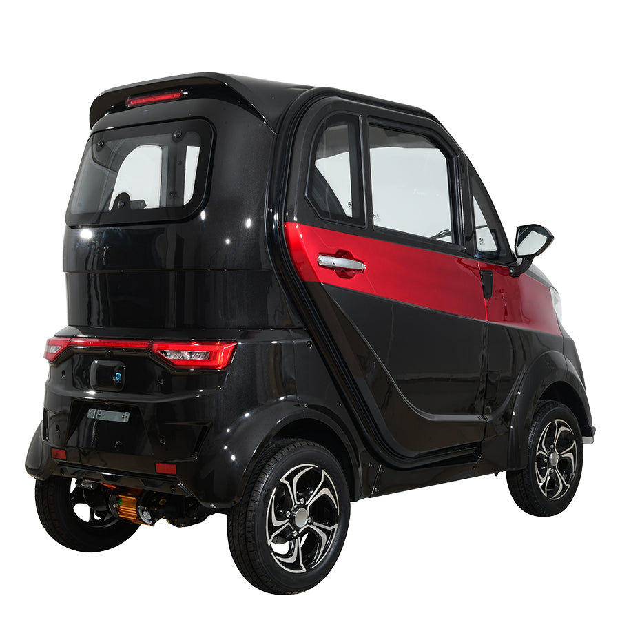 Black and red compact electric vehicle, rear angled view