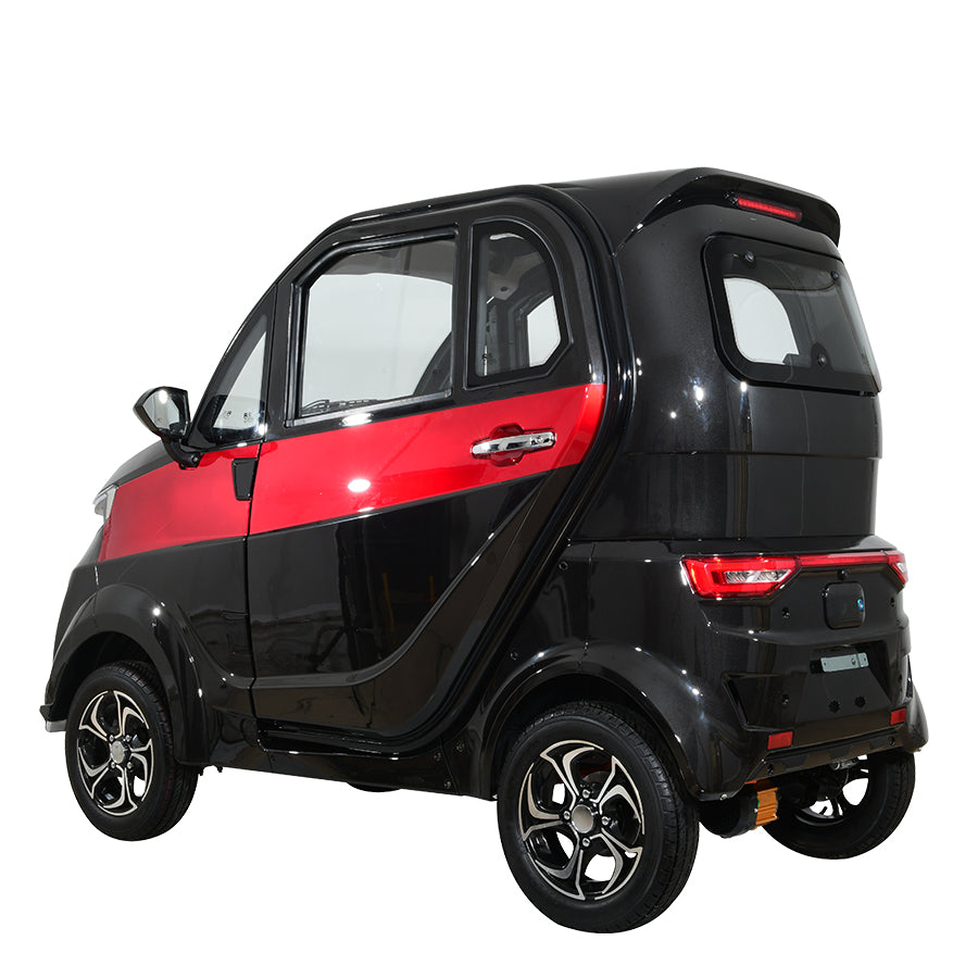 Black and red compact electric vehicle, rear side view