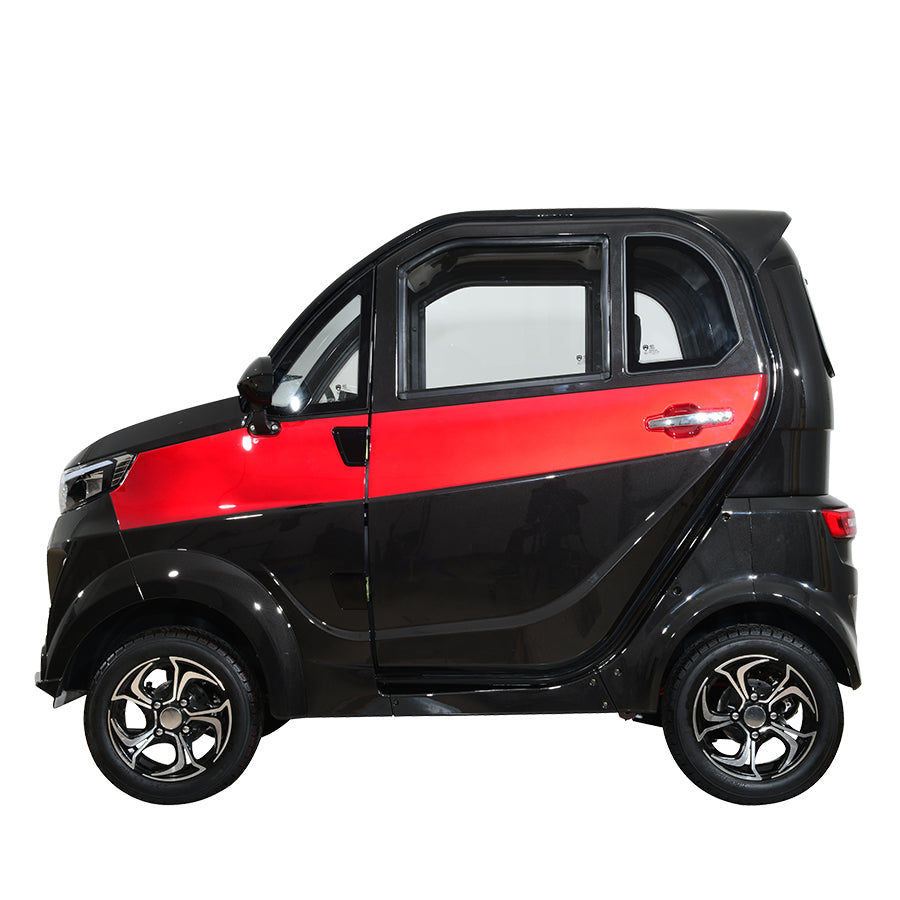 Black and red compact electric vehicle, side profile