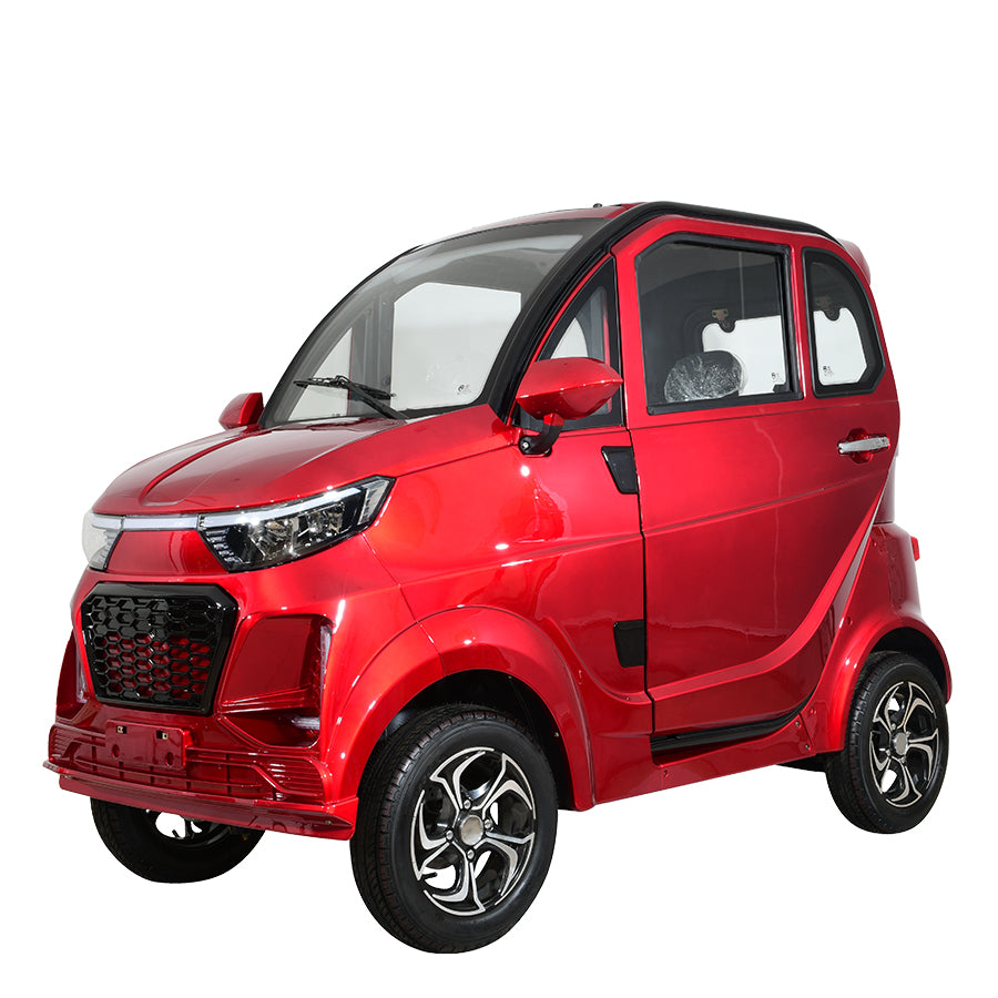 Red compact electric vehicle, side view