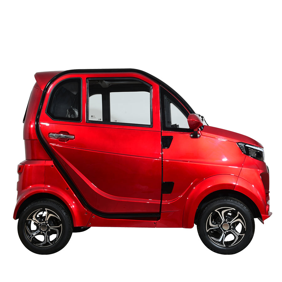 Red compact electric vehicle, side profile