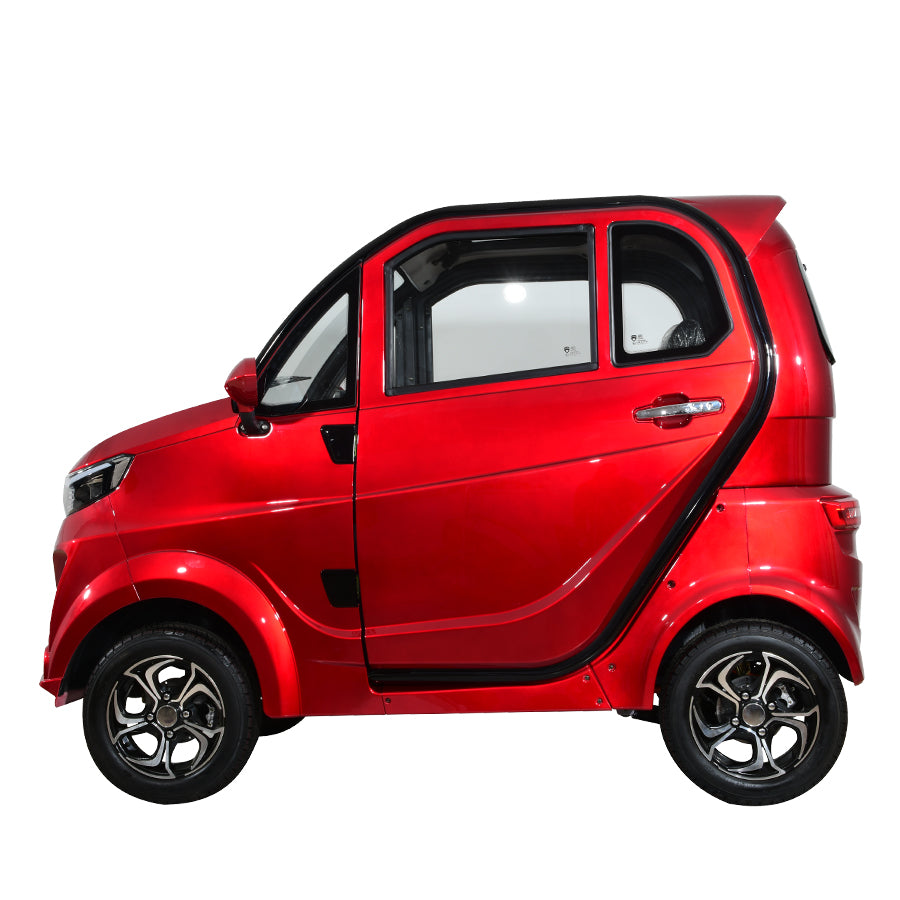 Red compact electric vehicle, side profile