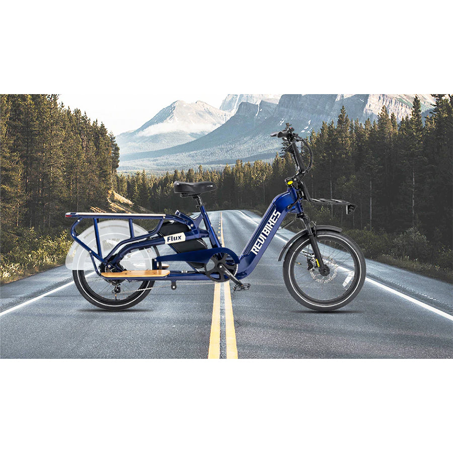 Bike displayed with mountain and forest background