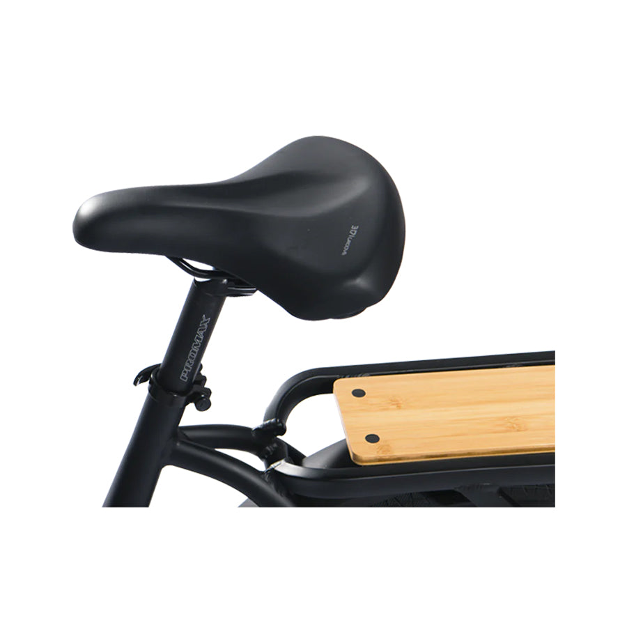 Bicycle saddle and partial view of the rear rack with light wooden base